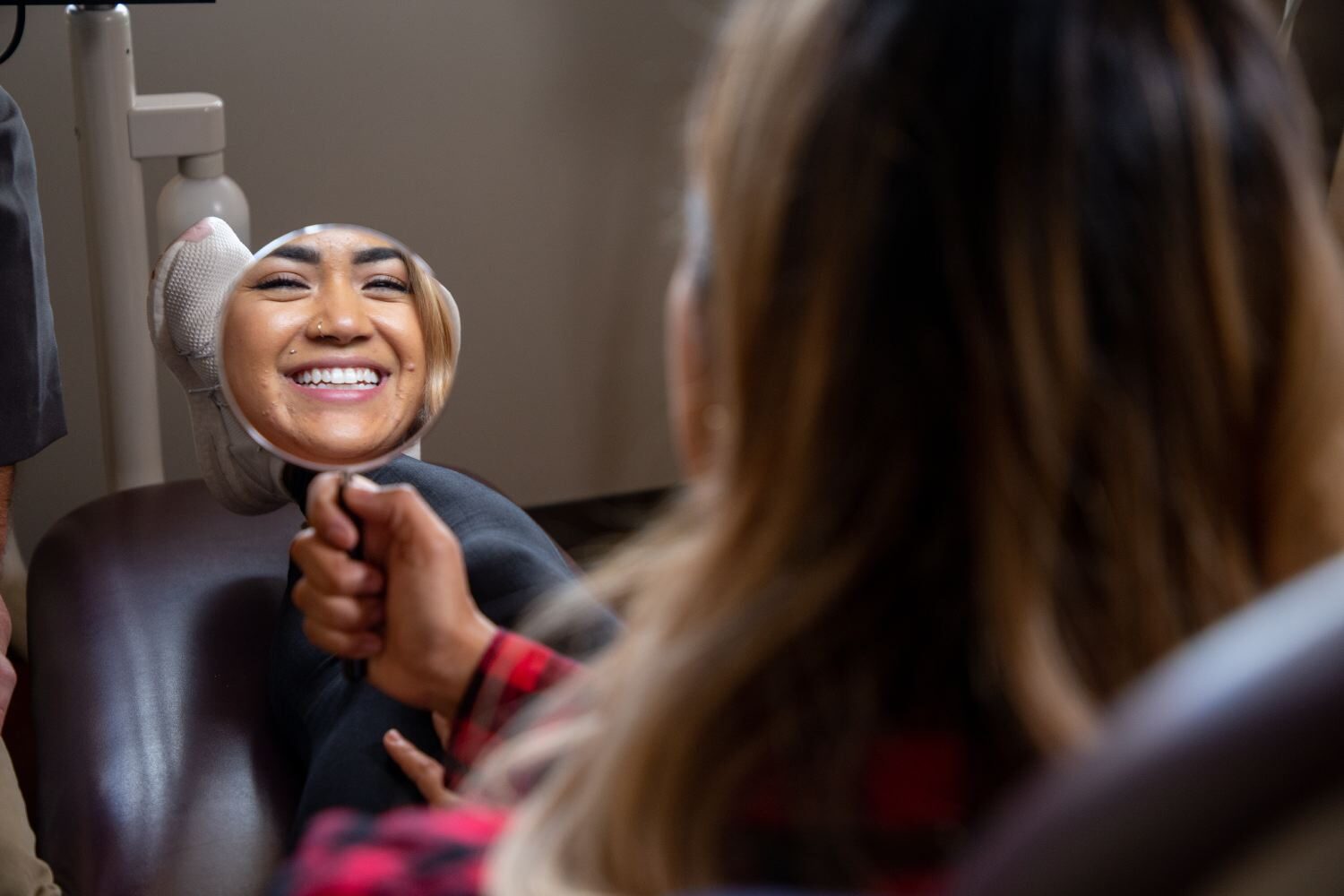 Woman smiling in mirror